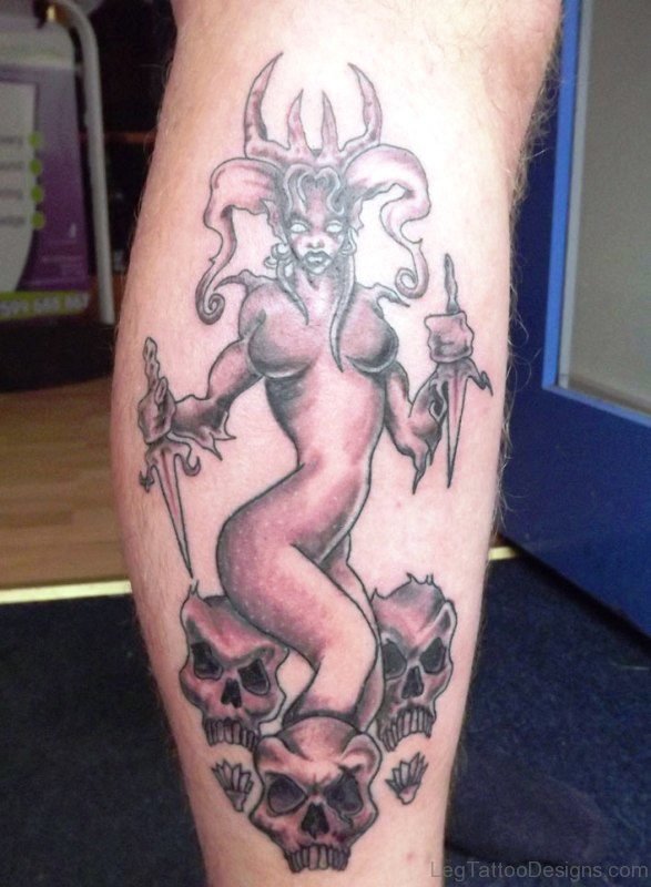 Female Evil Tattoo On Leg