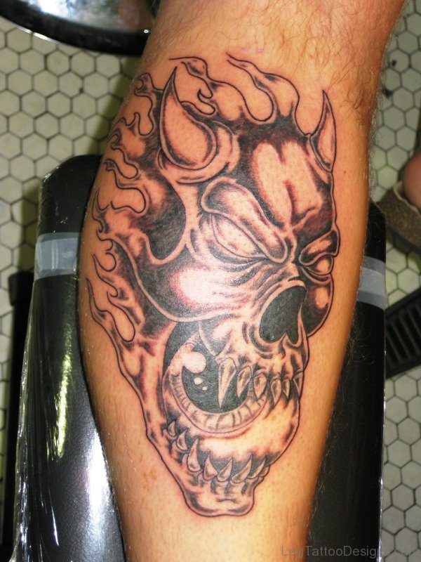 Flaming Evil Face Tattoo On Leg
