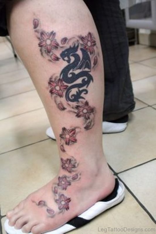 Flower And Dargon Tattoo On Leg