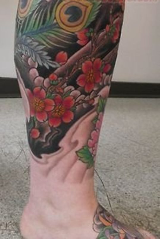 Flowers And Feather Tattoo