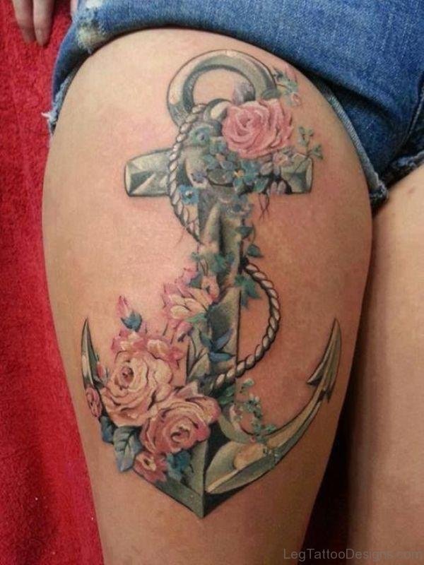 Flowr ANd Anchor Tattoo On Thigh