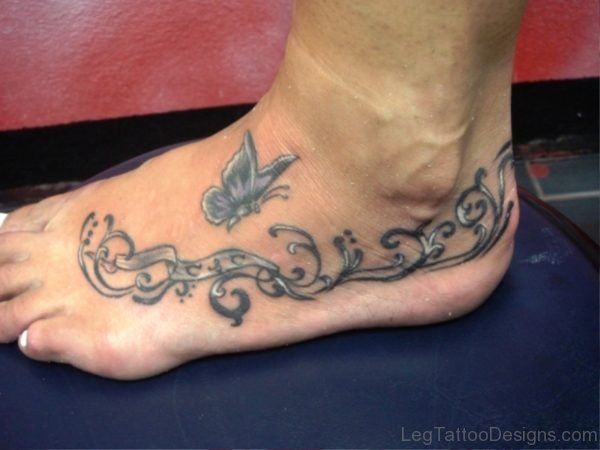Flying Butterfly Tattoo On Foot