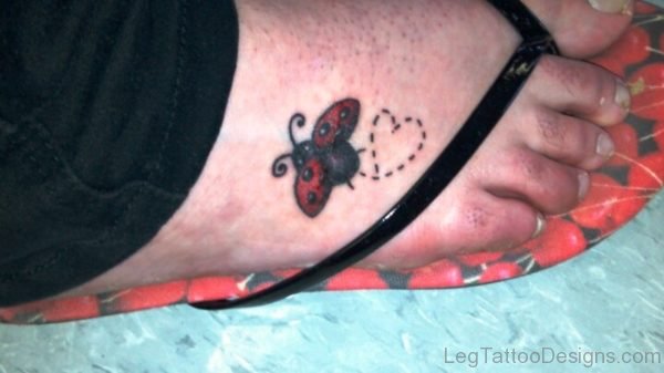 Flying Ladybug Tattoo On Foot