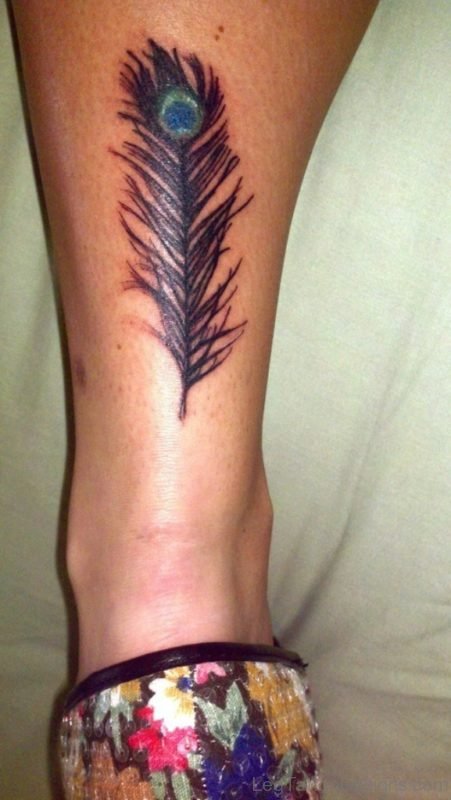 Great Feather Tattoo On Leg Image