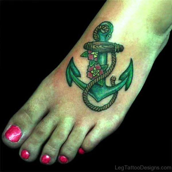 Green Color Anchor Tattoo On Foot
