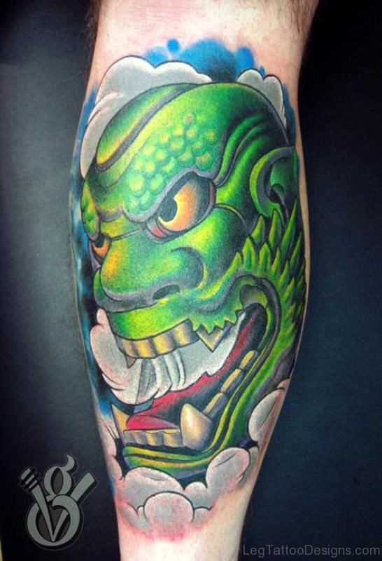 Green Face Evil Tattoo On Leg