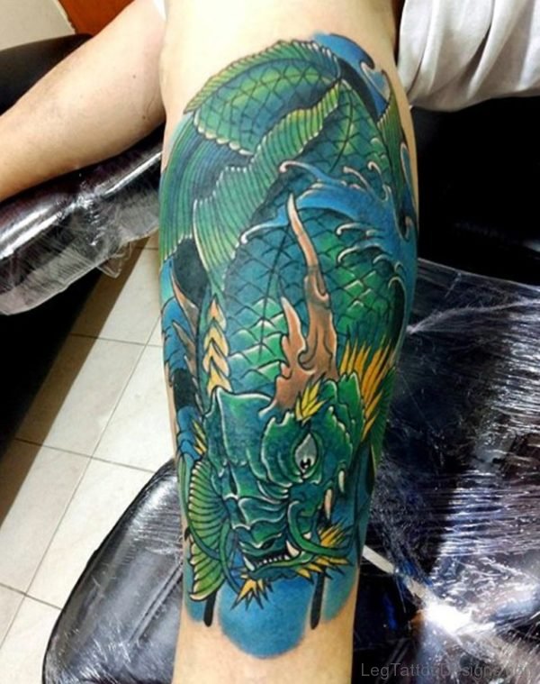 Green Koi Fish Tattoo On Leg