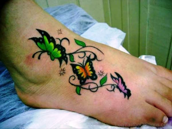 Green Orange Pink Butterflies Tattoo