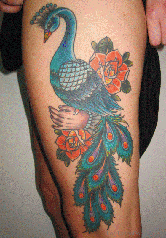Green Peacock Tattoo On Thigh