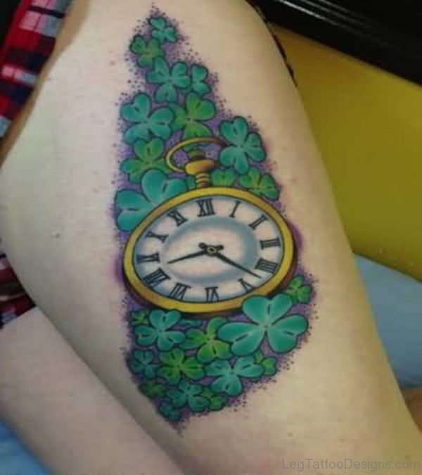 Green Shamrock Leaves And Clock Tattoo