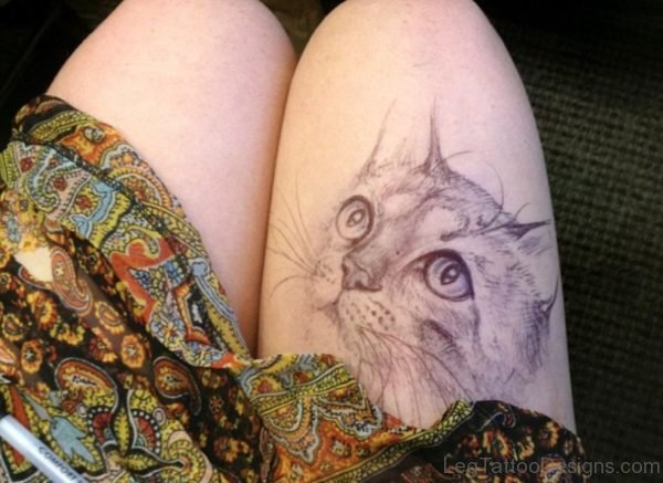 Grey Face Cat Tattoo On Thigh