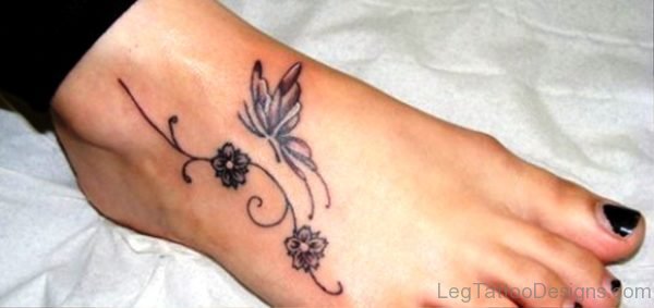 Grey Flowers And Butterfly Tattoo On Foot