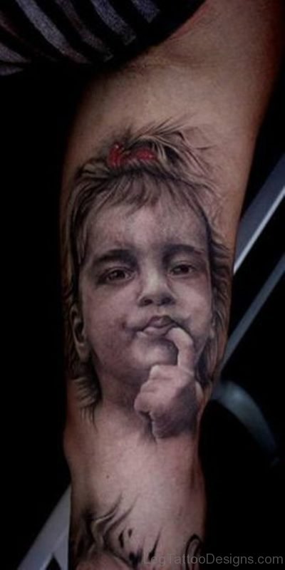 Grey Ink Cute Baby Portrait Tattoo