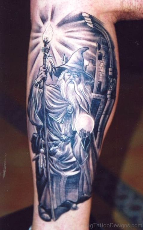 Grey Ink Viking Fantasy Tattoo On Calf