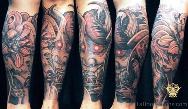 Grey Inked Evil Tattoo On Leg