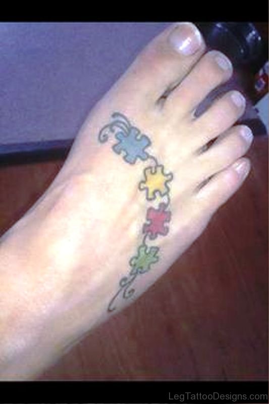 Image Of Autism Tattoo On Foot