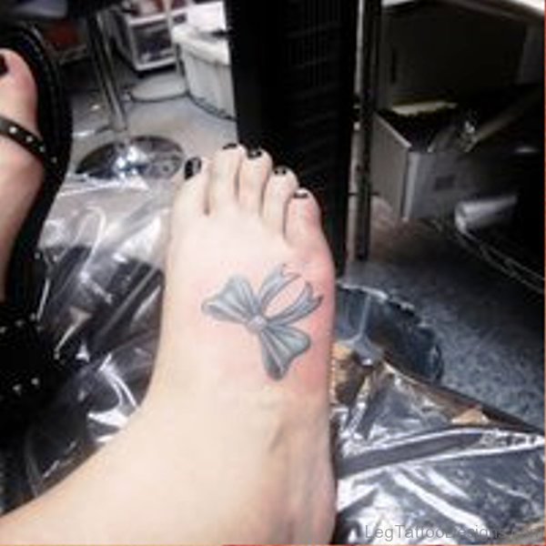 Image Of Bow Tattoo On Foot