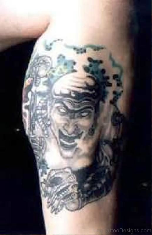 Image Of Evil Tattoo On Leg