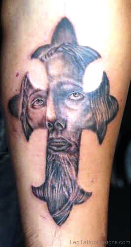 Jesus Face In Cross Tattoo On Leg