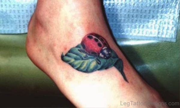 Ladybug On Leaf Tattoo