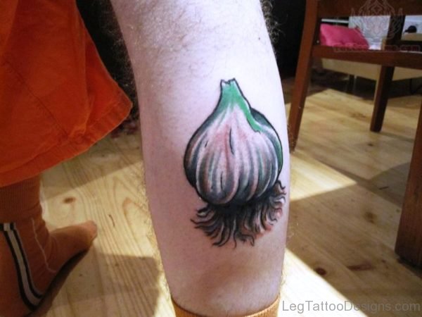 Large Garlic Tattoo On Calf