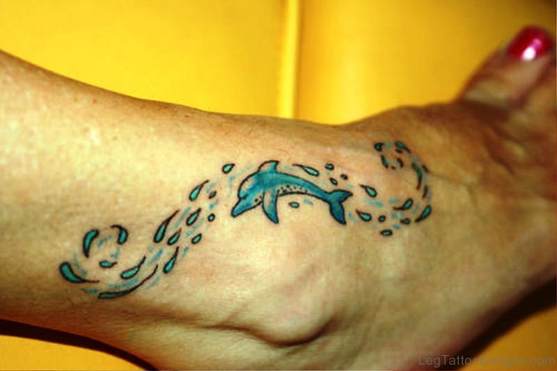 Little Blue Dolphin Tattoo On Foot