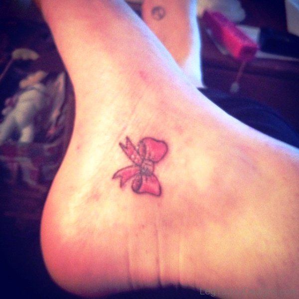 Little Pink Bow Tattoo On Foot
