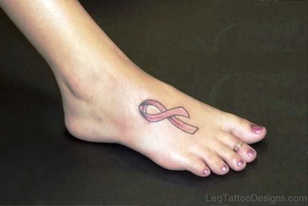 Lovely Cancer Ribbon Tattoo On Foot