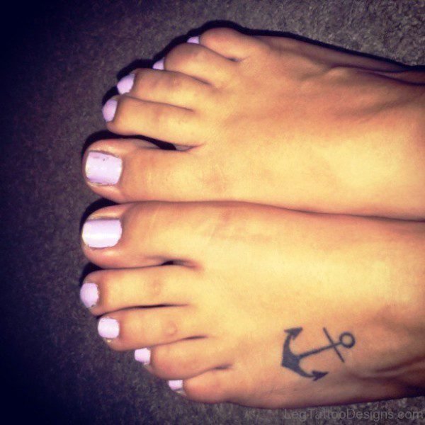 Lovely Small Anchor Tattoo On Foot
