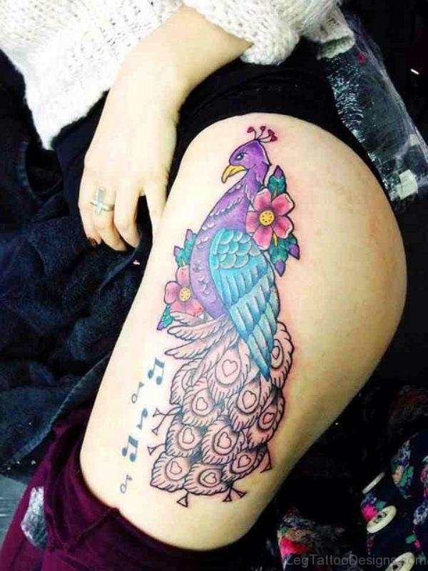 Magnifying Peacock Tattoo On Thigh