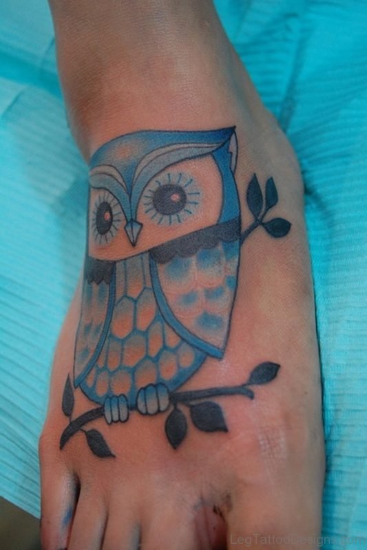 Marvelous Blue Owl Tattoo On Foot