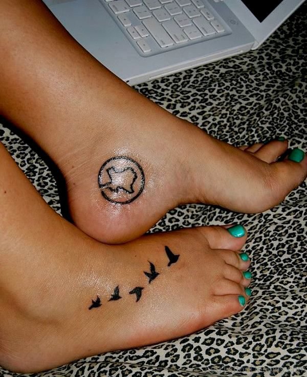 Nice Flying Bird Tattoo On Foot