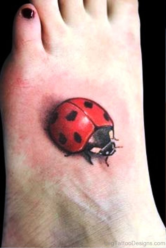 Nice Ladybug Tattoo On Foot