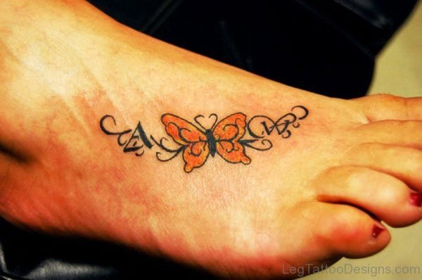 Orange Butterfly Tattoo On Foot