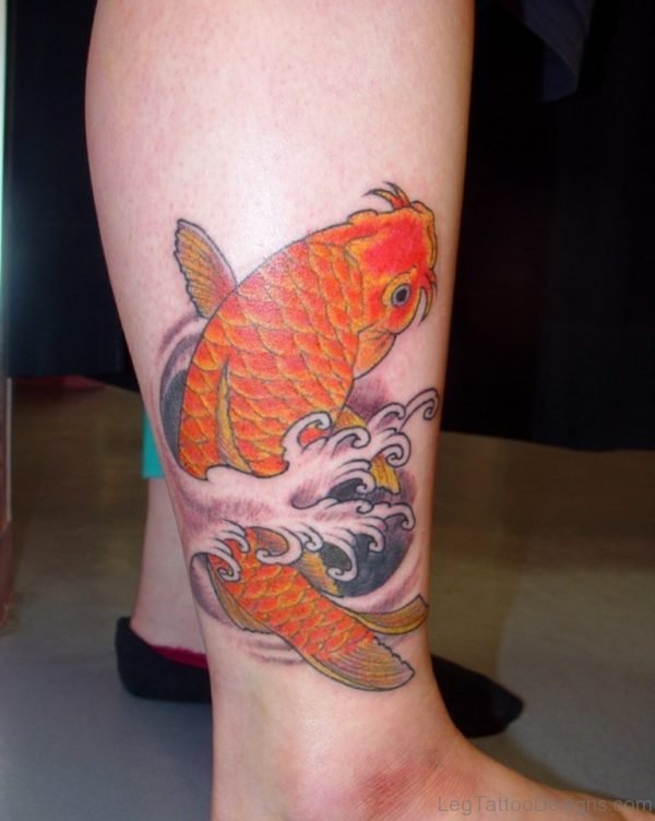 Orange Fish Tattoo On Leg