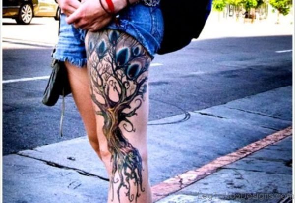 Peacock Feather Tree Tattoo On Thigh