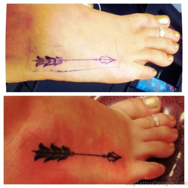 Photo Of Arrow Tattoo On Foot