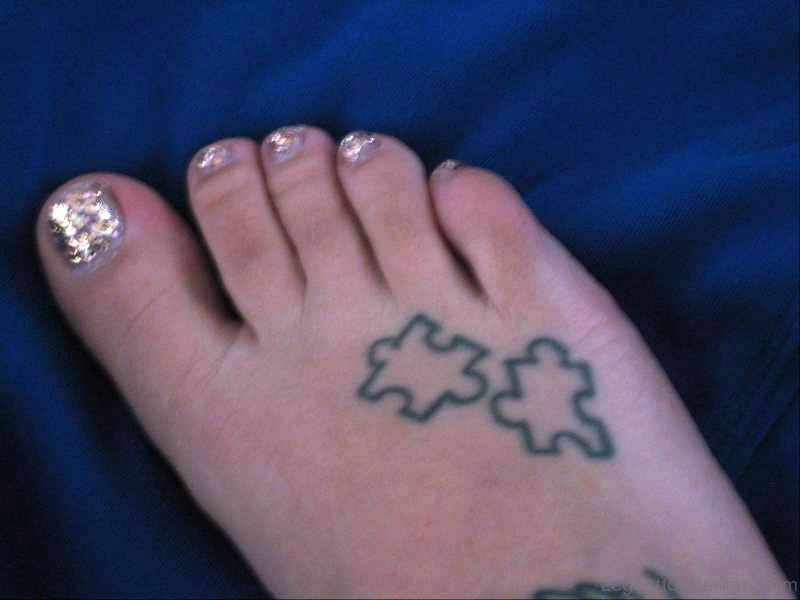 Pic Of Autism Tattoo On Foot