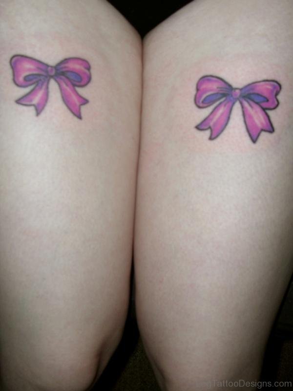 Pink Bow Tattoo On Thigh