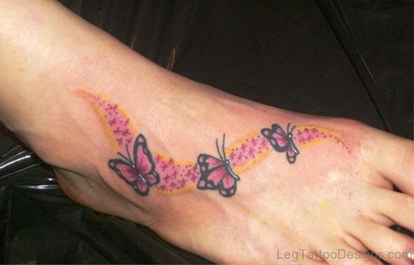 Pink Butterlies Tattoo On Foot