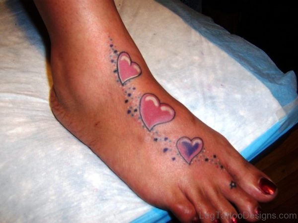 Pink Hearts Tattoo On Foot