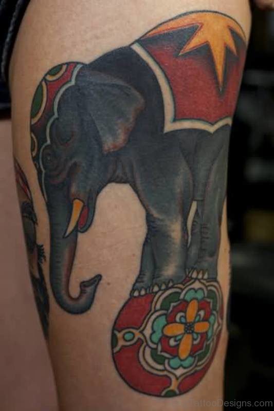 Playing Elephant Tattoo On Thigh