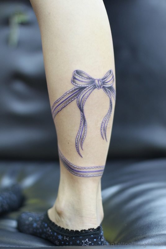 Purple Bow Tattoo On Leg