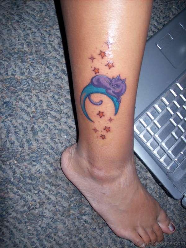 Purple Cat On Moon Tattoo On Leg