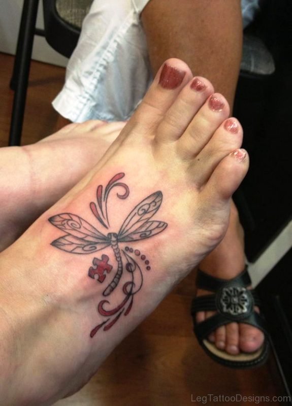 Red Autism With Dragonfly Tattoo On Foot