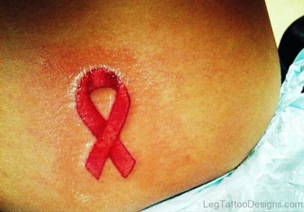 Red Cancer Ribbon Tattoo On Back Foot