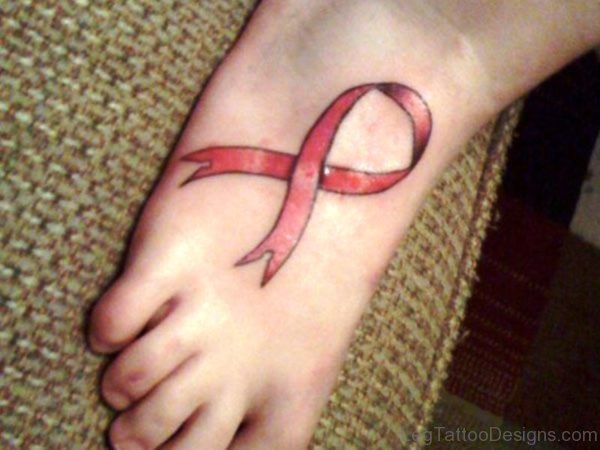 Red Cancer Ribbon Tattoo On Foot