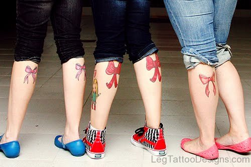 Red Ribbow Boe Tattoo On Leg