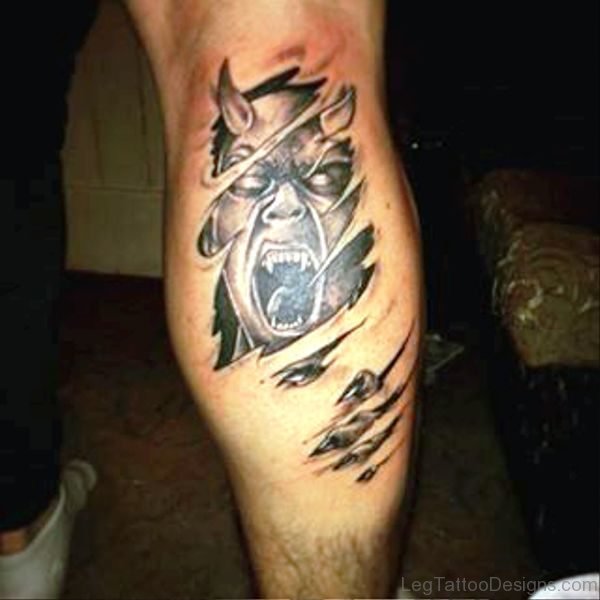 Ripped Skin Evil Tattoo On Leg