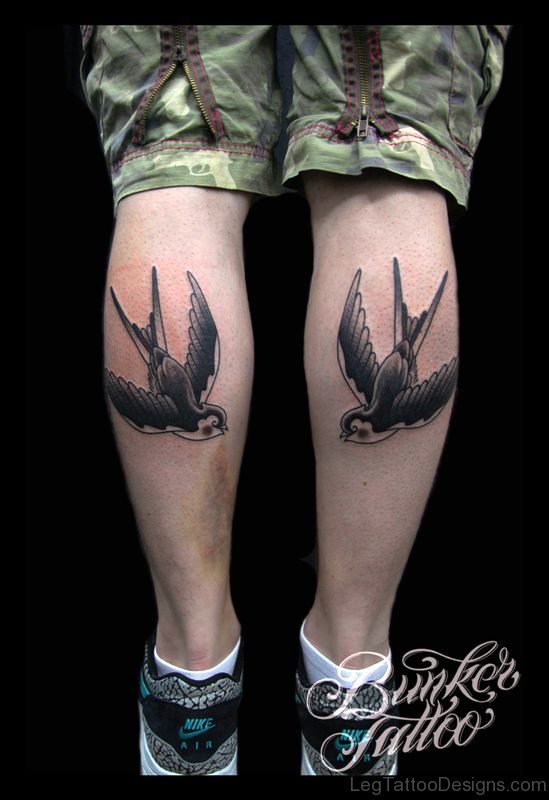 Roger Swallow Tattoo On Calf